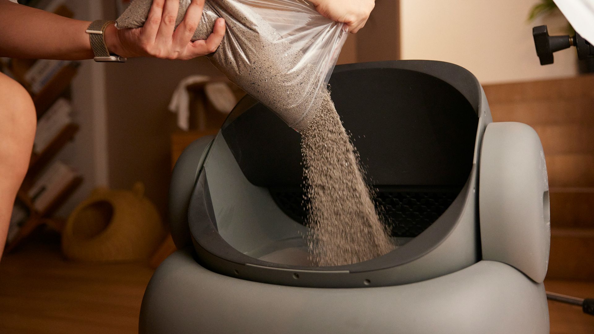 A woman in a silver dress is washing her feet