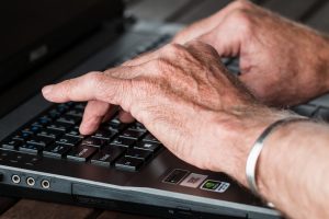 hands_old_typing_laptop_internet_working_writer_old_person-770100-1550557068459-300x200.jpg