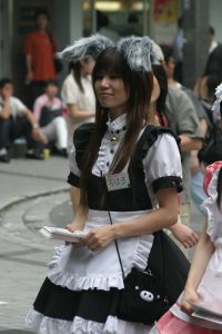 French_maid_handing_out_flyers_-_Do_bunny_ears_go_with_a_French_maid_outfit___Who_cares_shes_attractive._2006-07-09_01.37.20_by_interiot-200x300.jpg