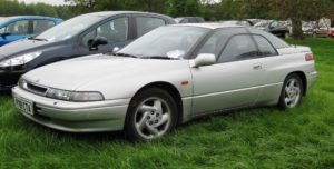 Subaru_SVX_in_parkland_in_the_British_West_Midlands_first_registered_February_1997_3317cc-300x152.jpg