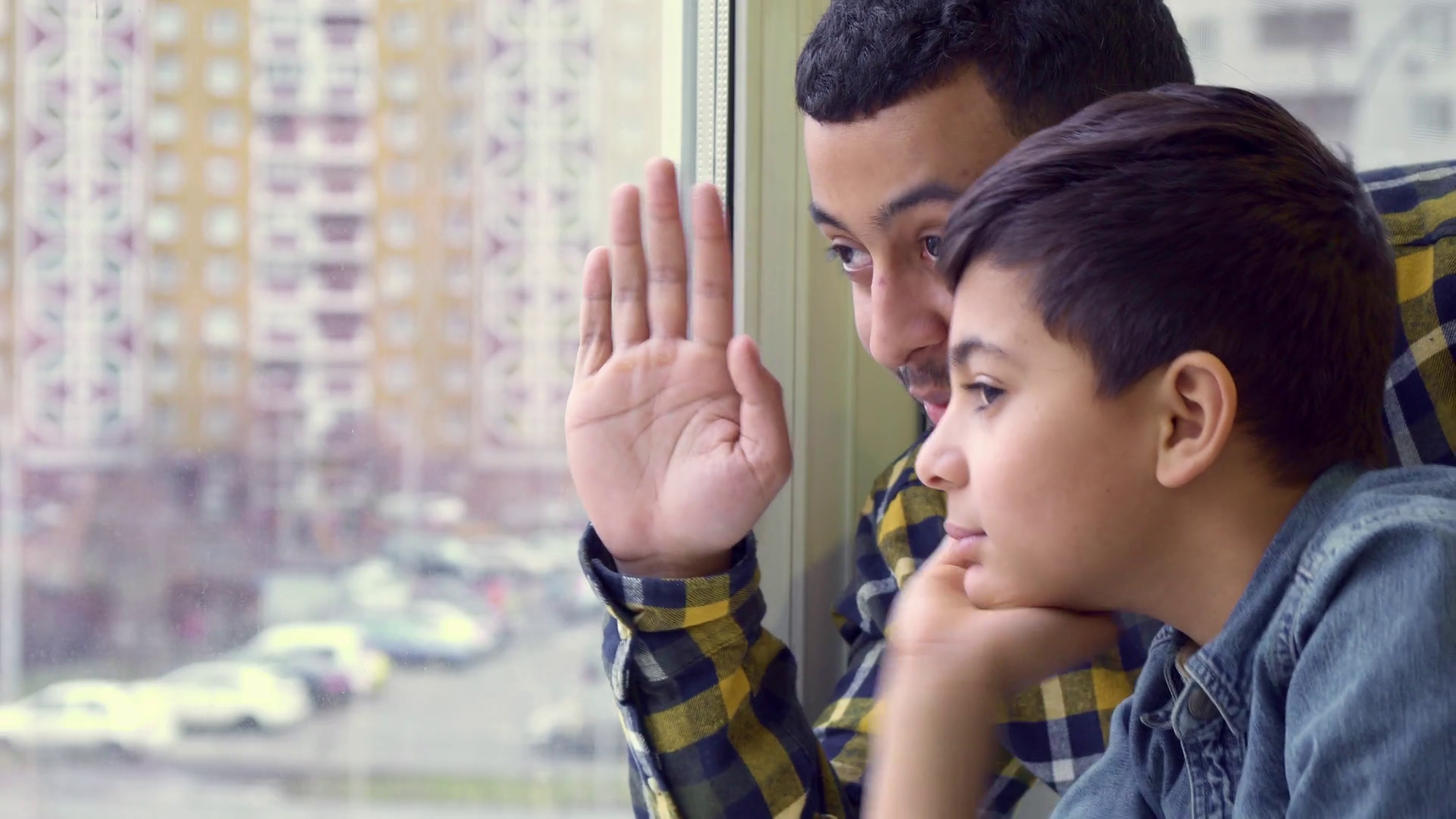 attractive-little-boy-and-his-father-waving-out-the-window-close-up-of-handsome-african-american-man-and-his-son-raising-their-hands-young-black-guy-and-his-child-seeing-somebody-at-the-street-from_hiuqbaole_thumbnail-full01.png
