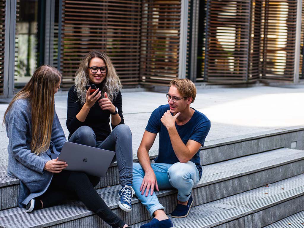 resizethree-persons-sitting-on-the-stairs-talking-with-each-other-1438072.jpg.optimal.jpg