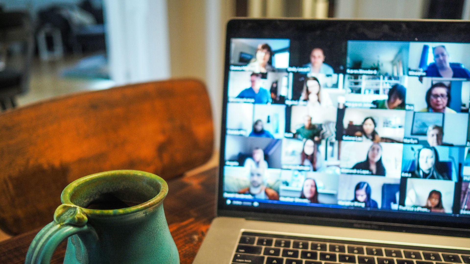 macbook pro displaying group of people
