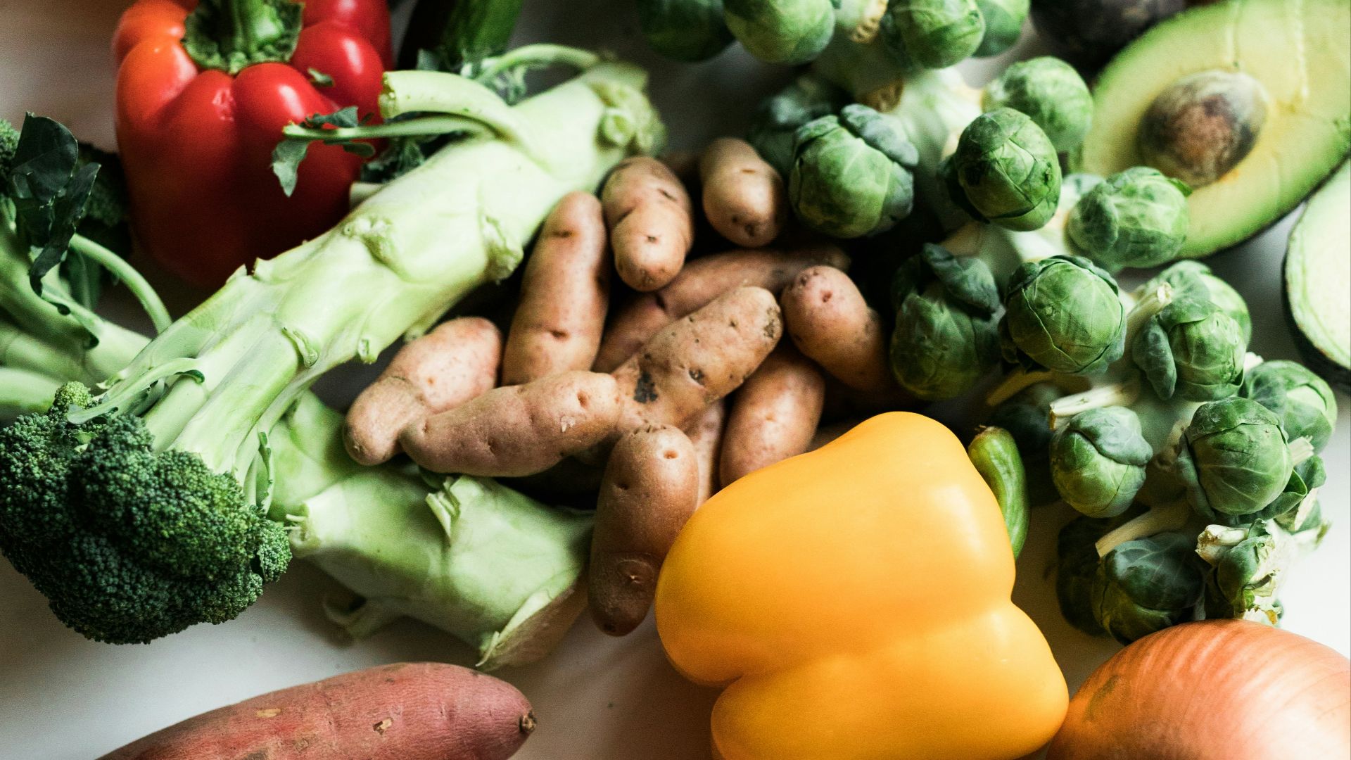 sliced carrots and green vegetable