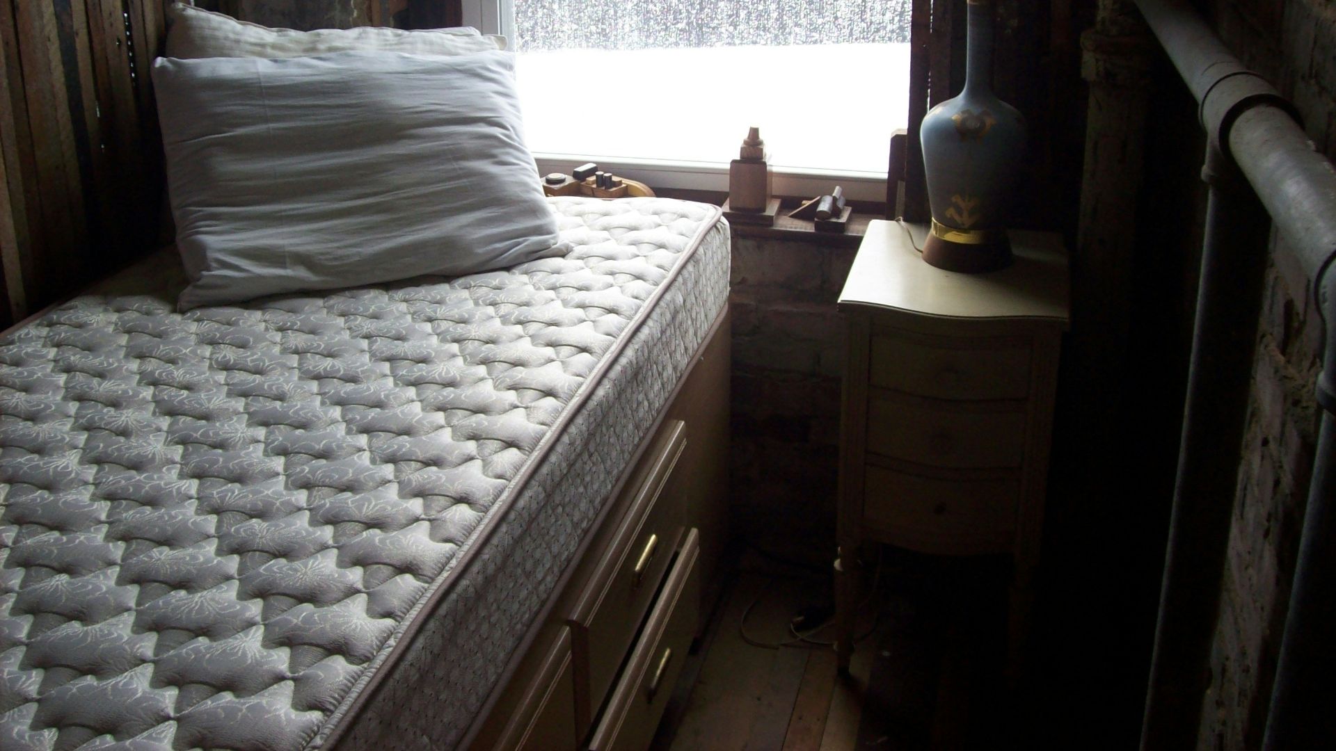 white and black bed linen