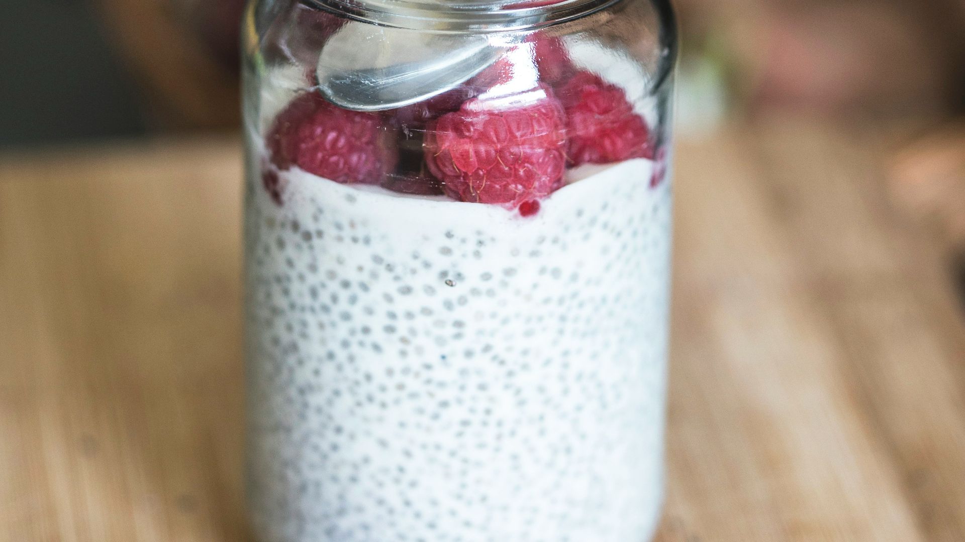 red cherries on clear glass bowl