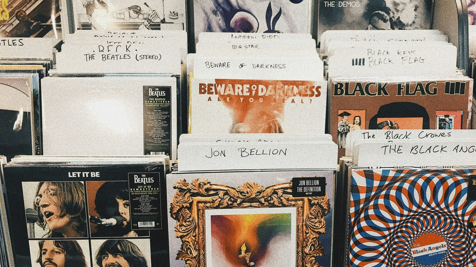 pile of assorted-title vinyl album record sleeves