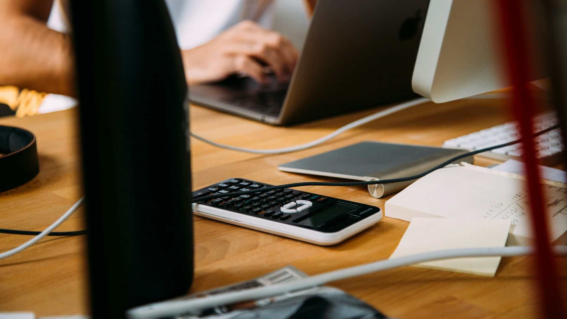 person using silver MacBook