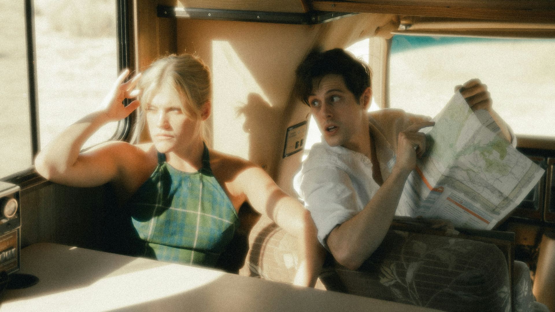 woman in green long sleeve shirt sitting on chair