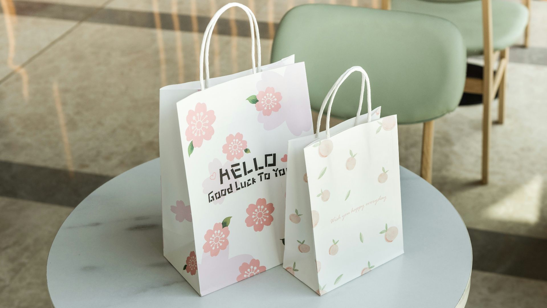 a couple of shopping bags on a table