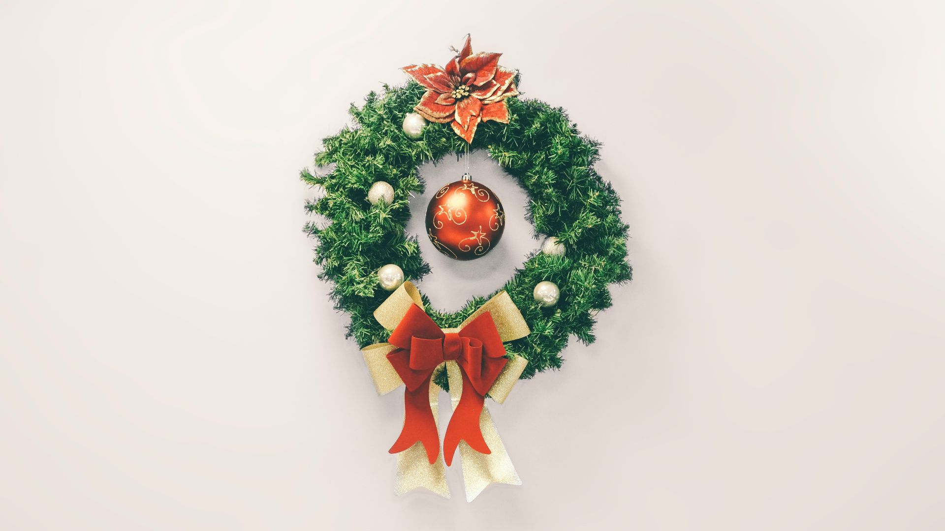 green and red Christmas wreath