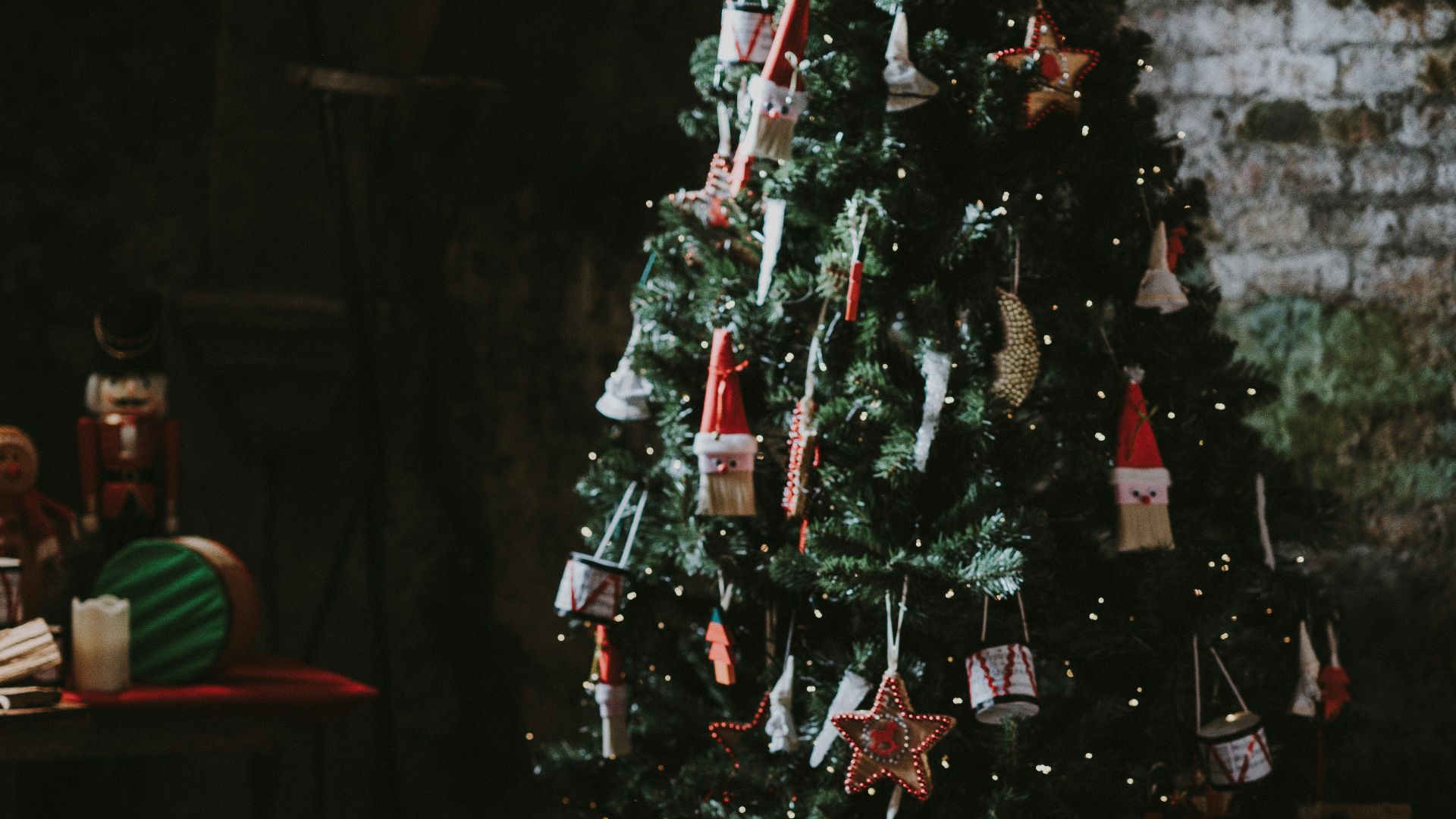green Christmas tree near wall