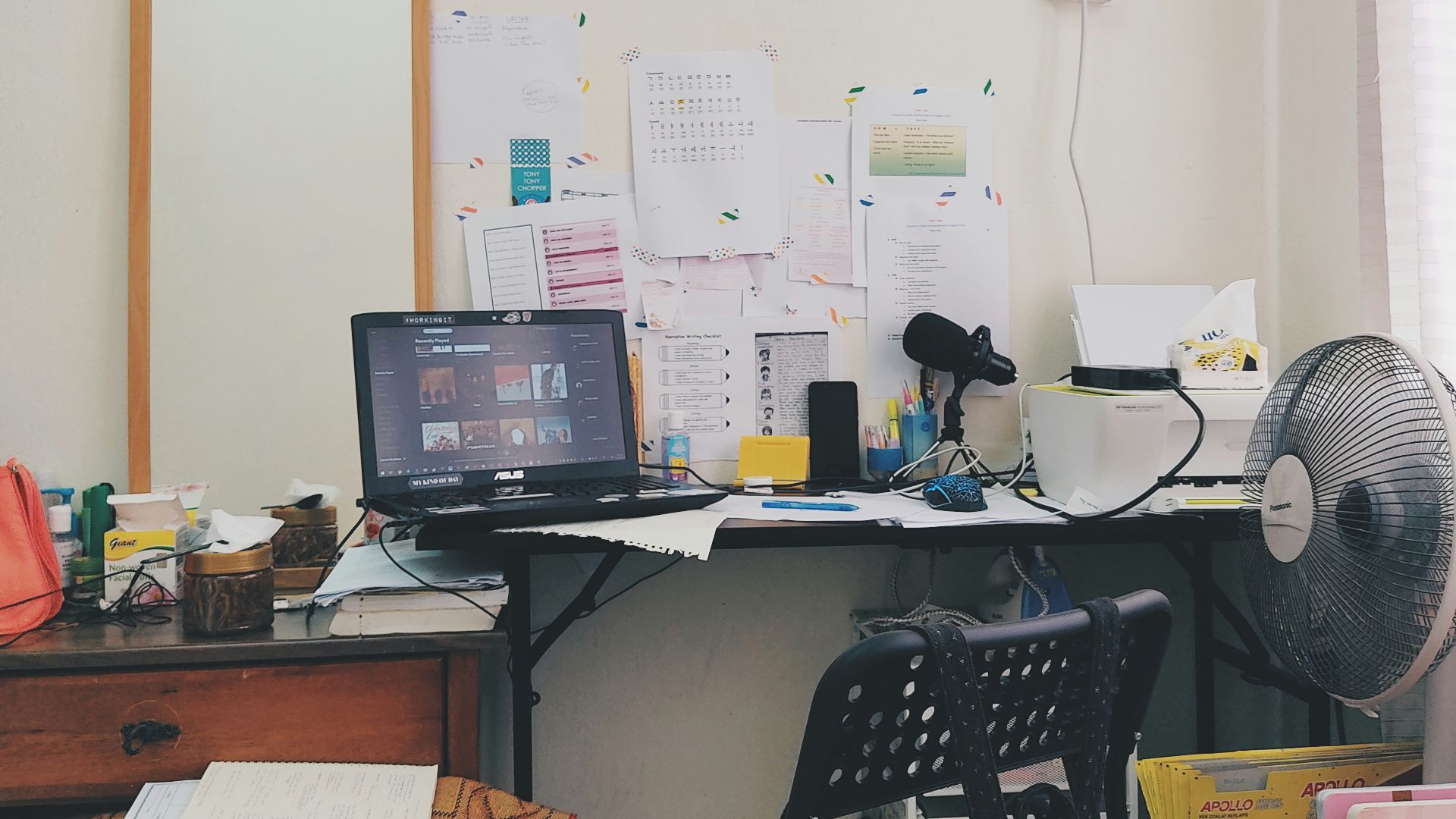 black flat screen computer monitor on brown wooden desk