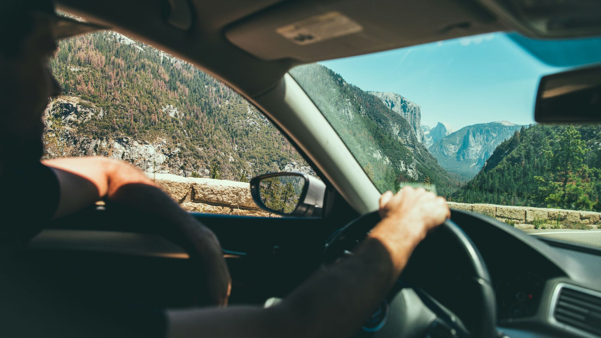 smiling man while driving