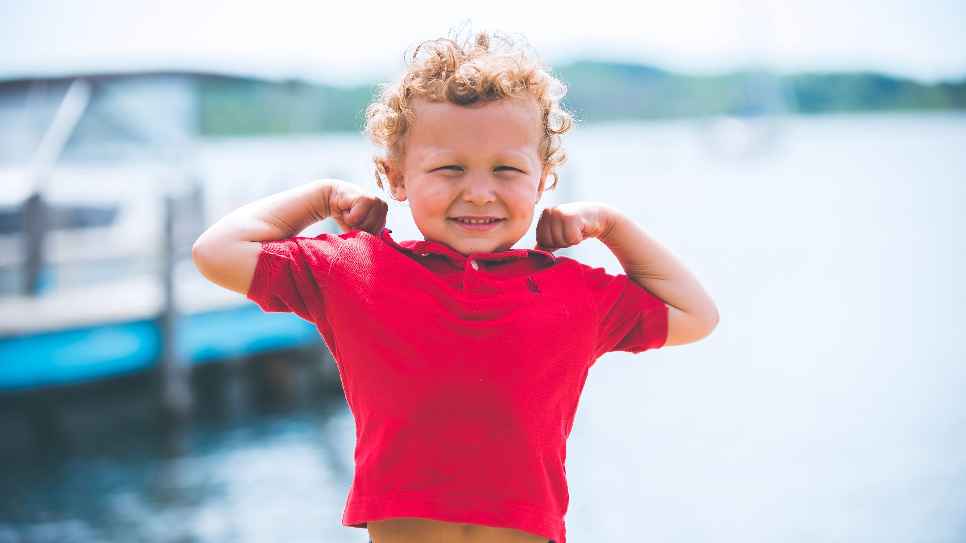 boy standing near dock