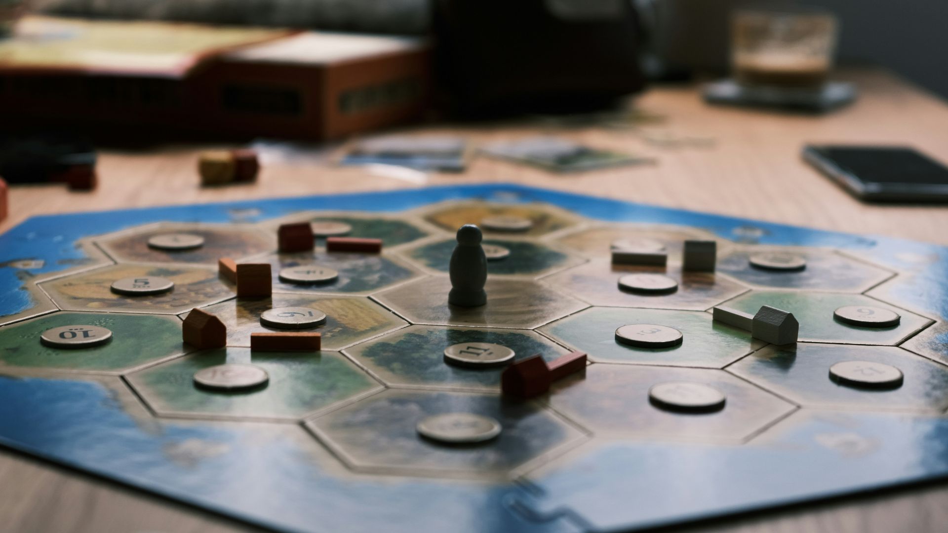blue and brown chess piece on blue and white table