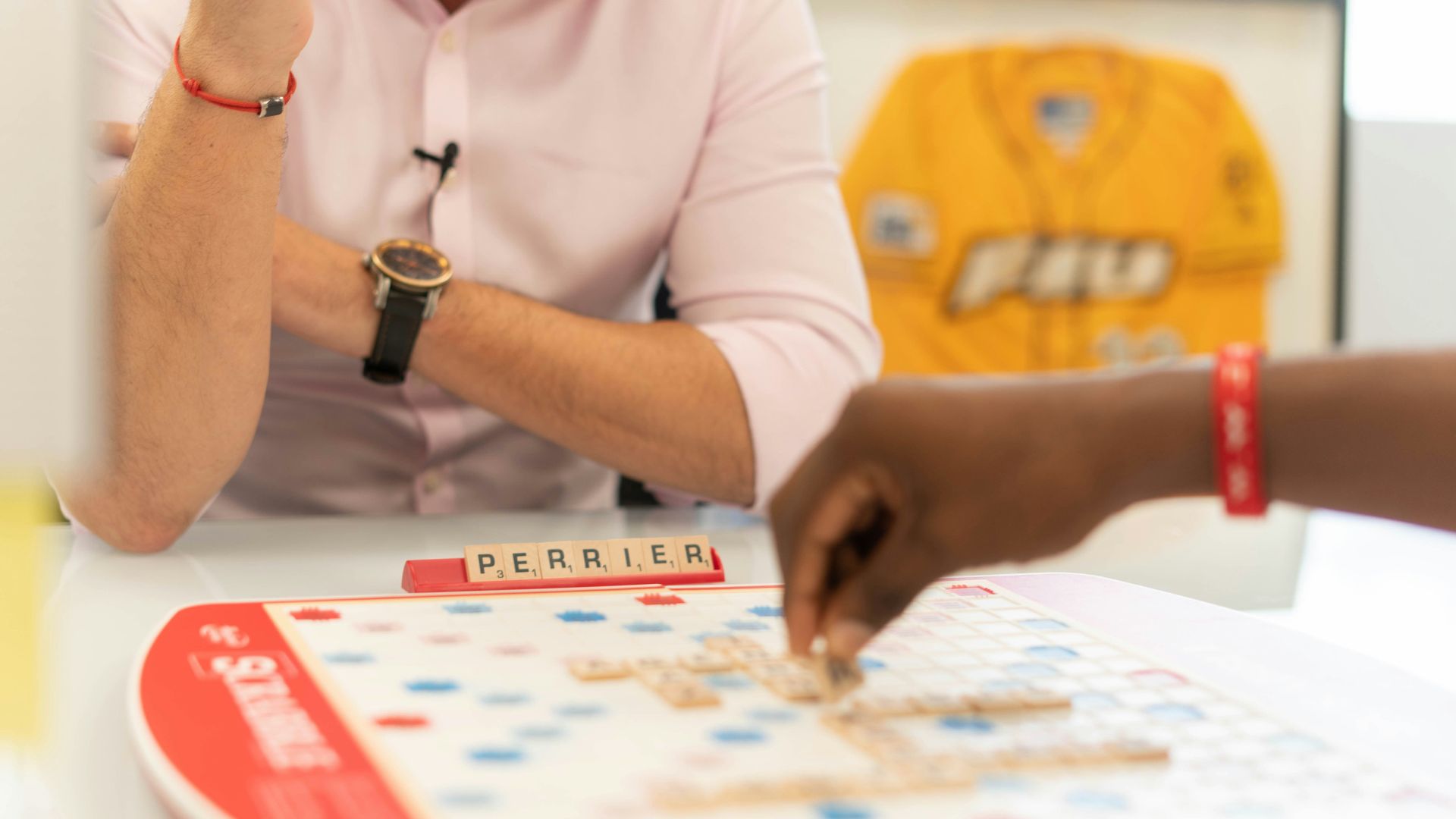 woman in white long sleeve shirt playing chess