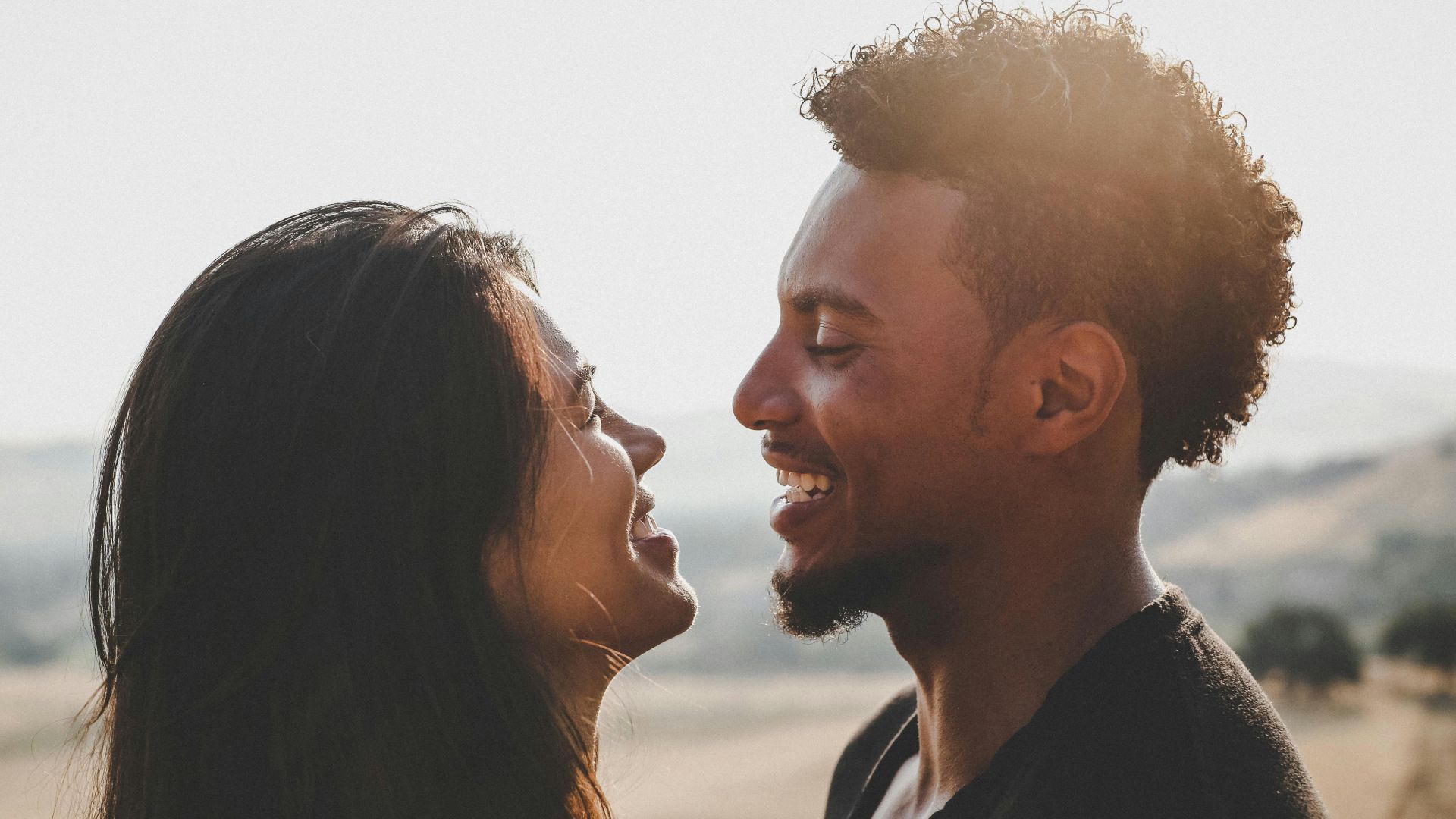 man and woman facing