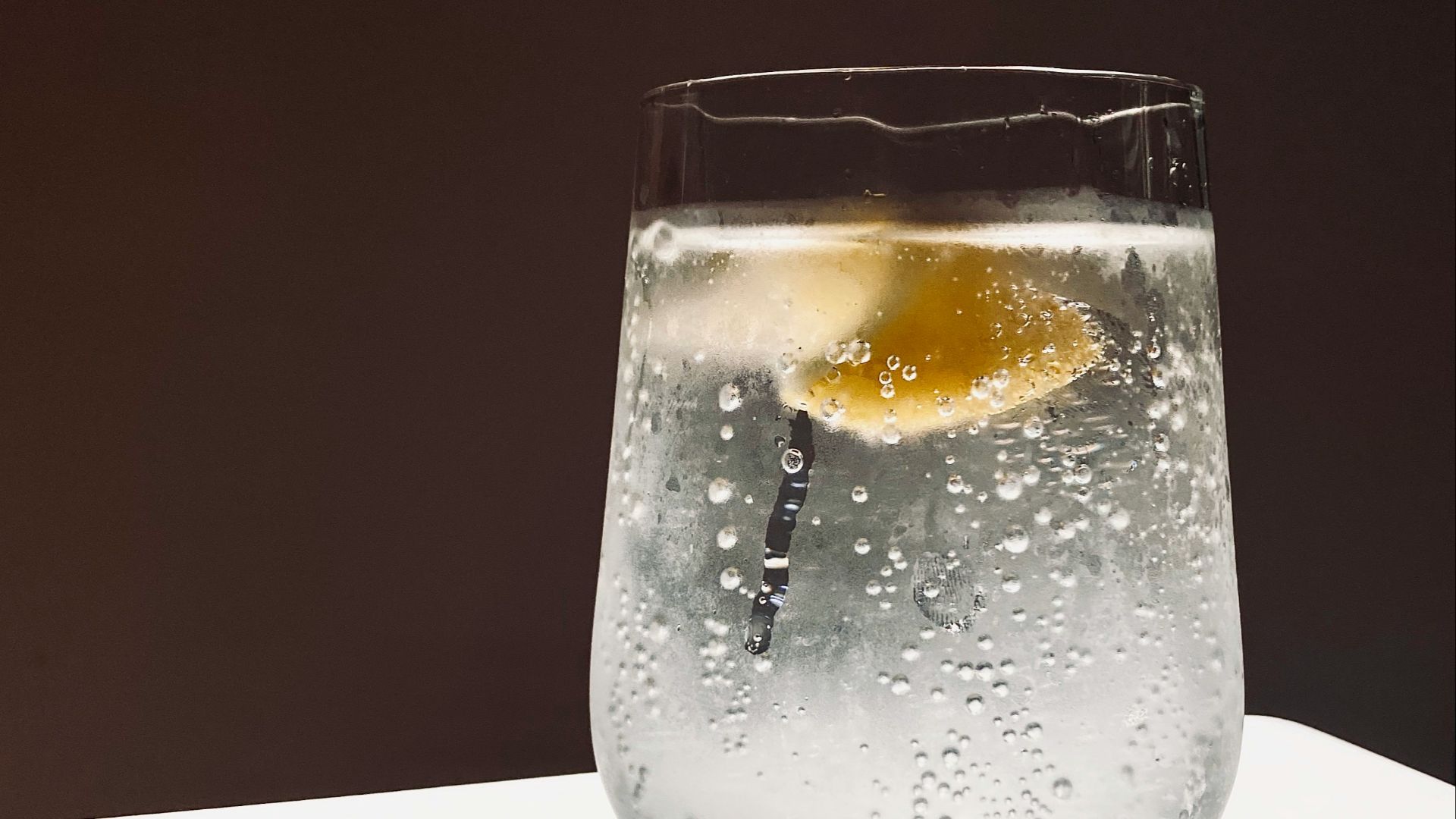 clear glass cup with water