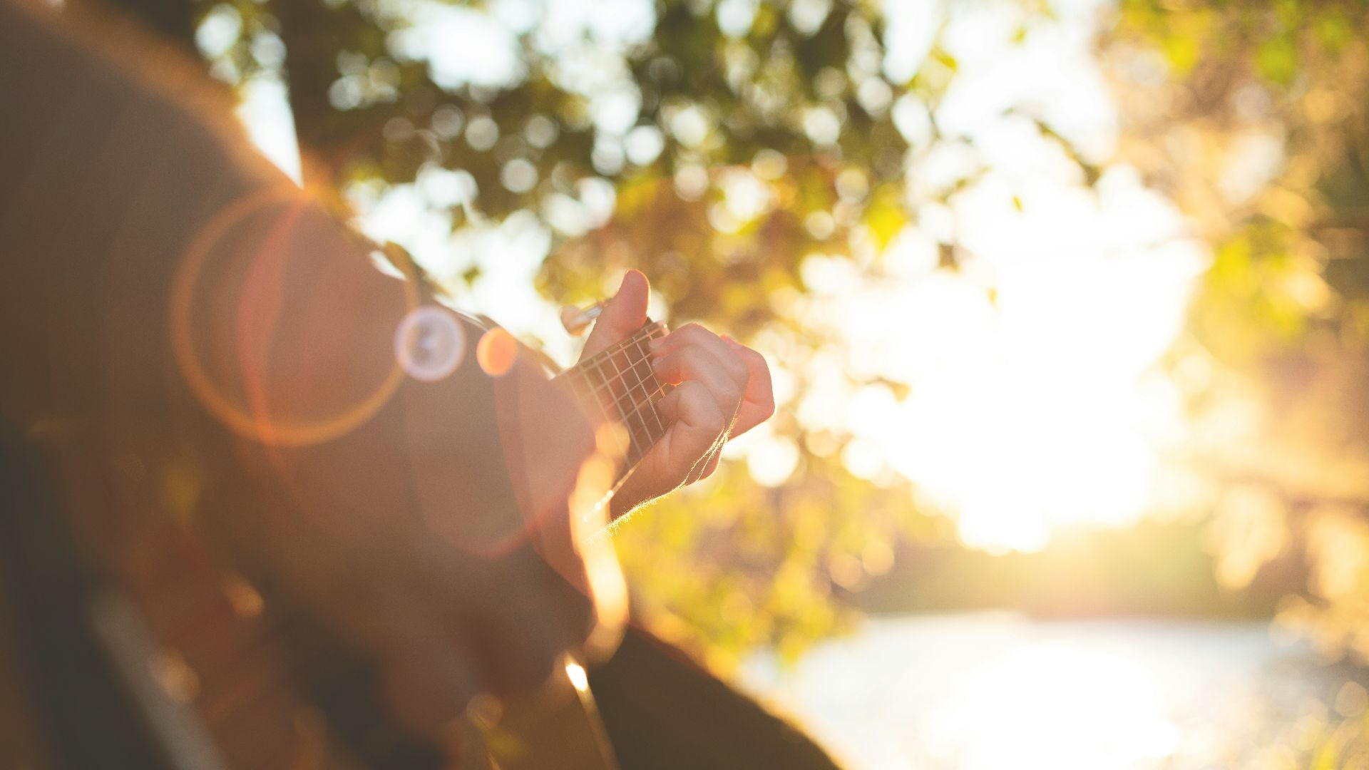 person playing guitar