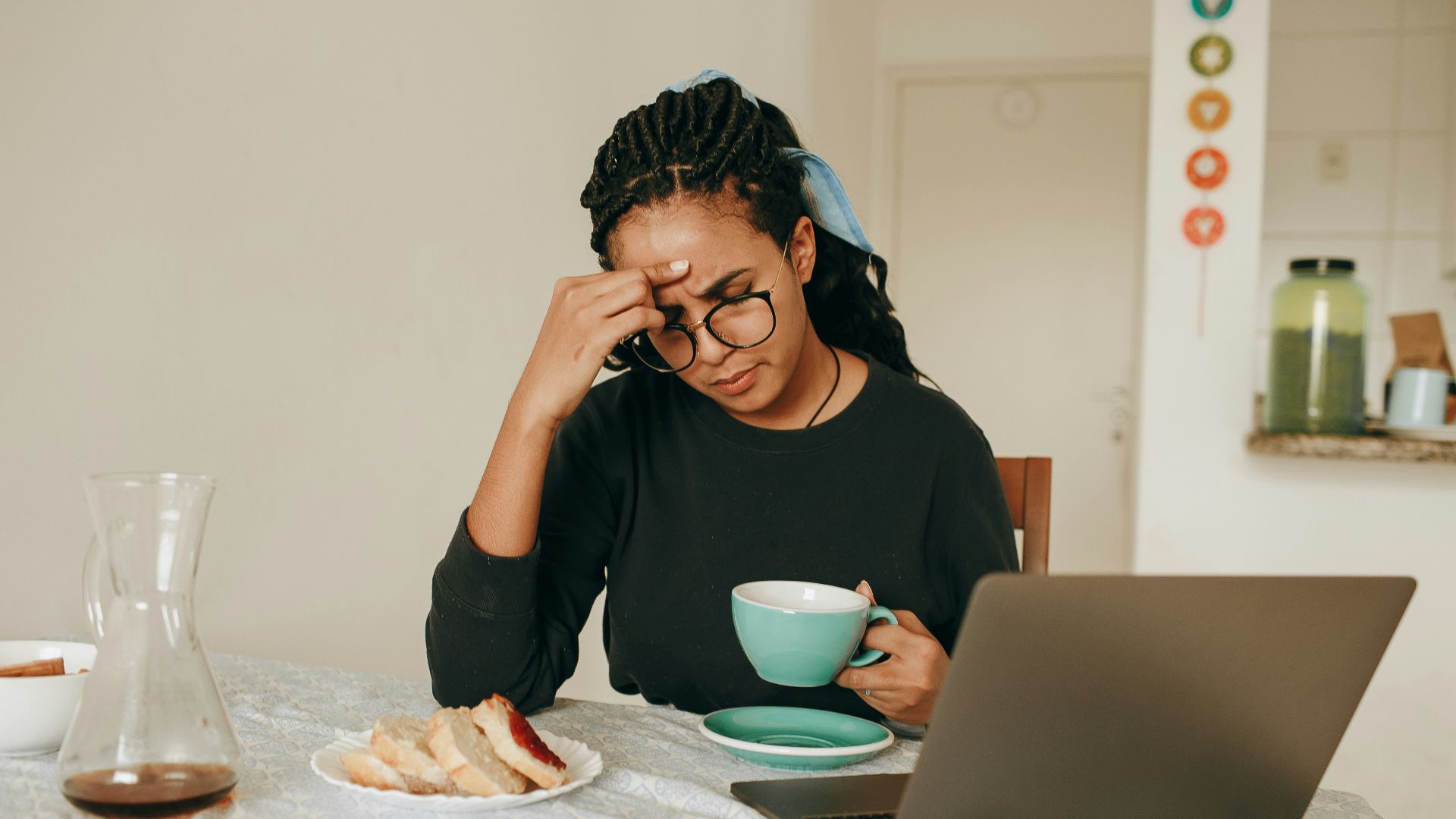 woman in black long sleeve shirt sitting on chair