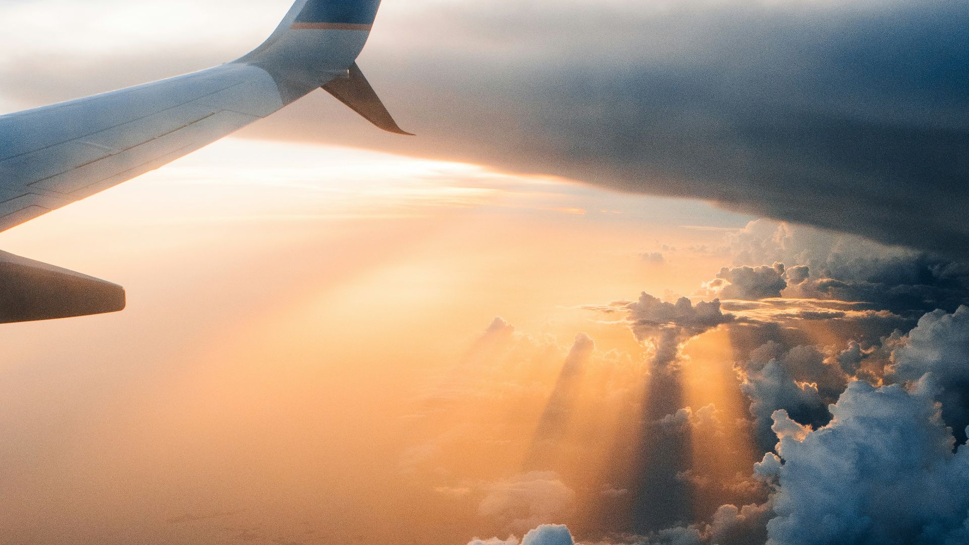 airplane on sky during golden hour