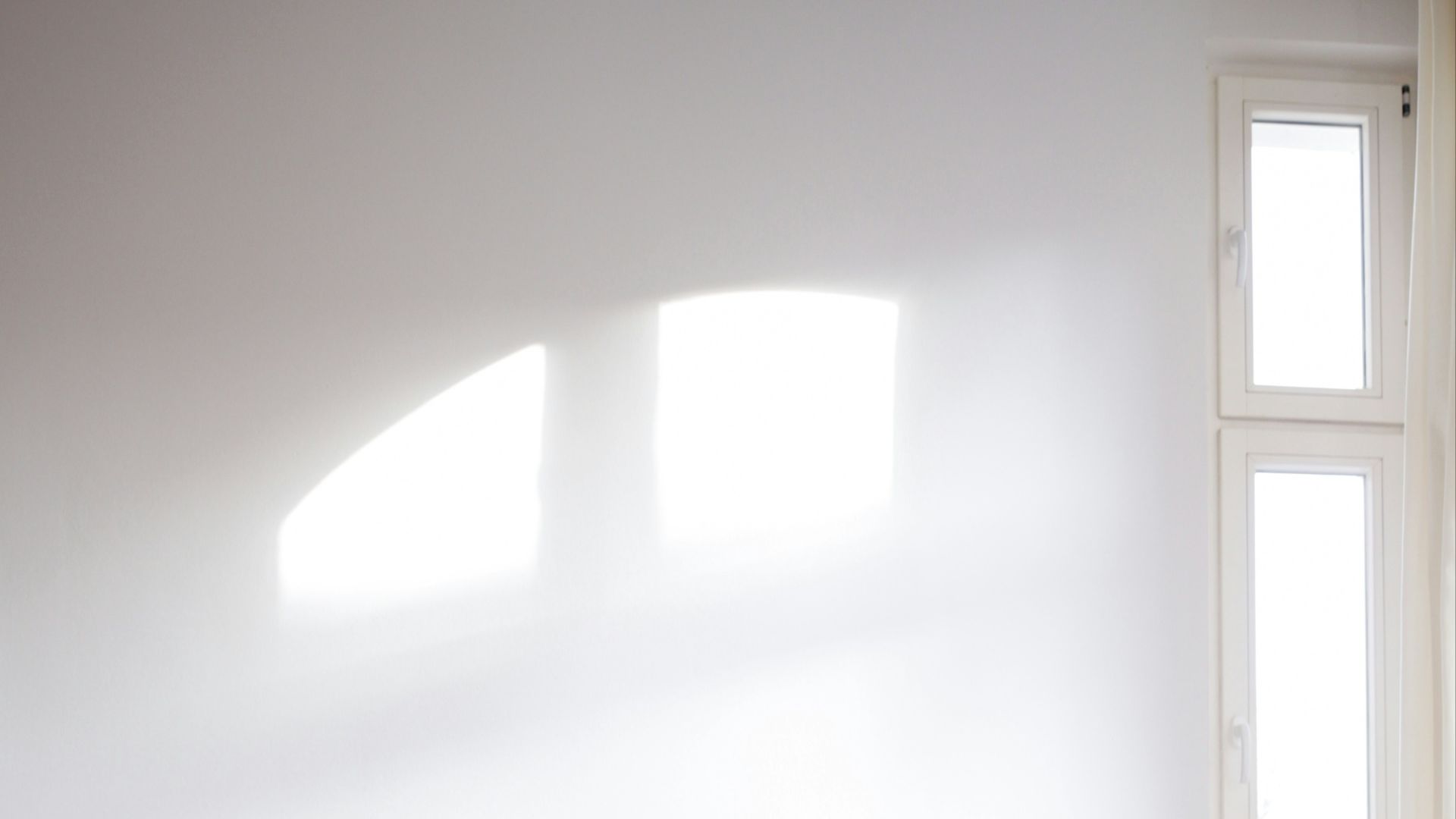 brown wooden table beside gray couch