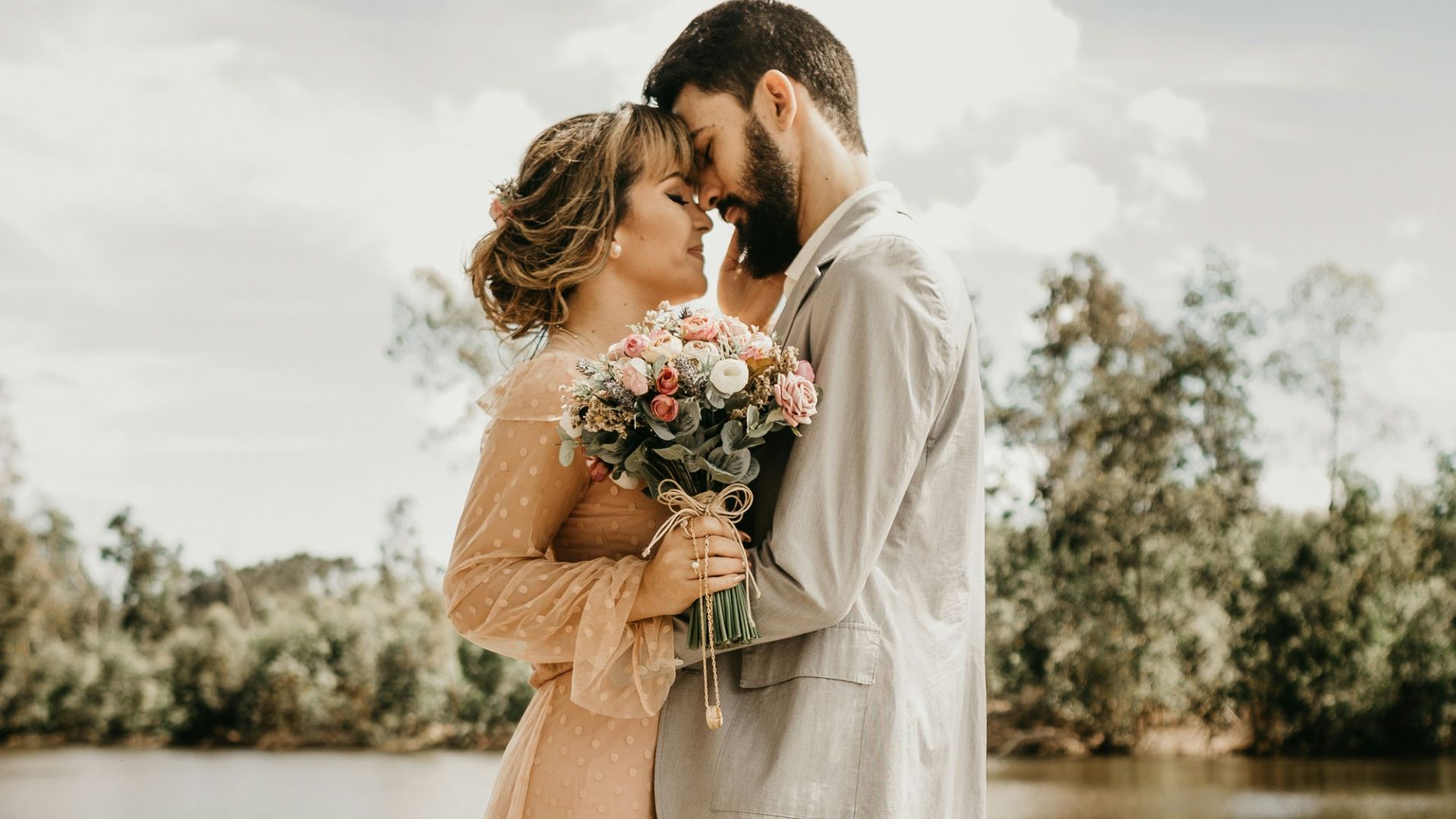 couple standing on dock