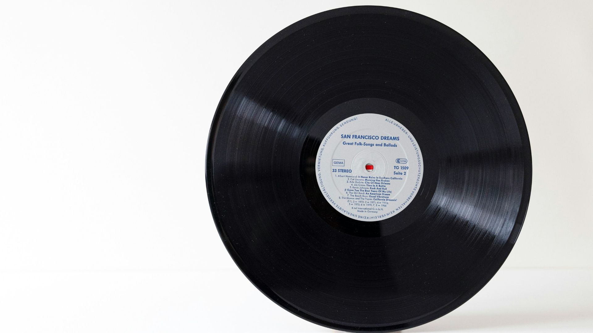 a black circular object with a white label on it