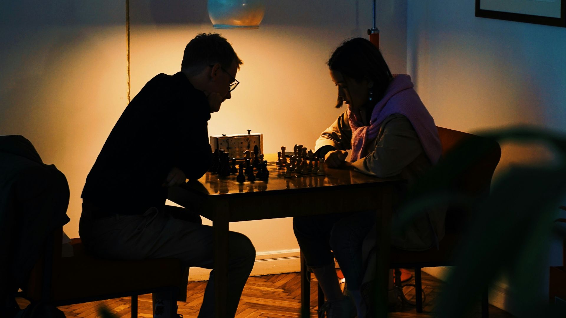 a group of people sitting at a table with drinks