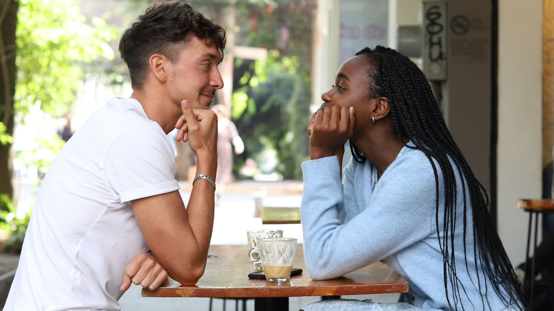 a man and a woman sitting at a table