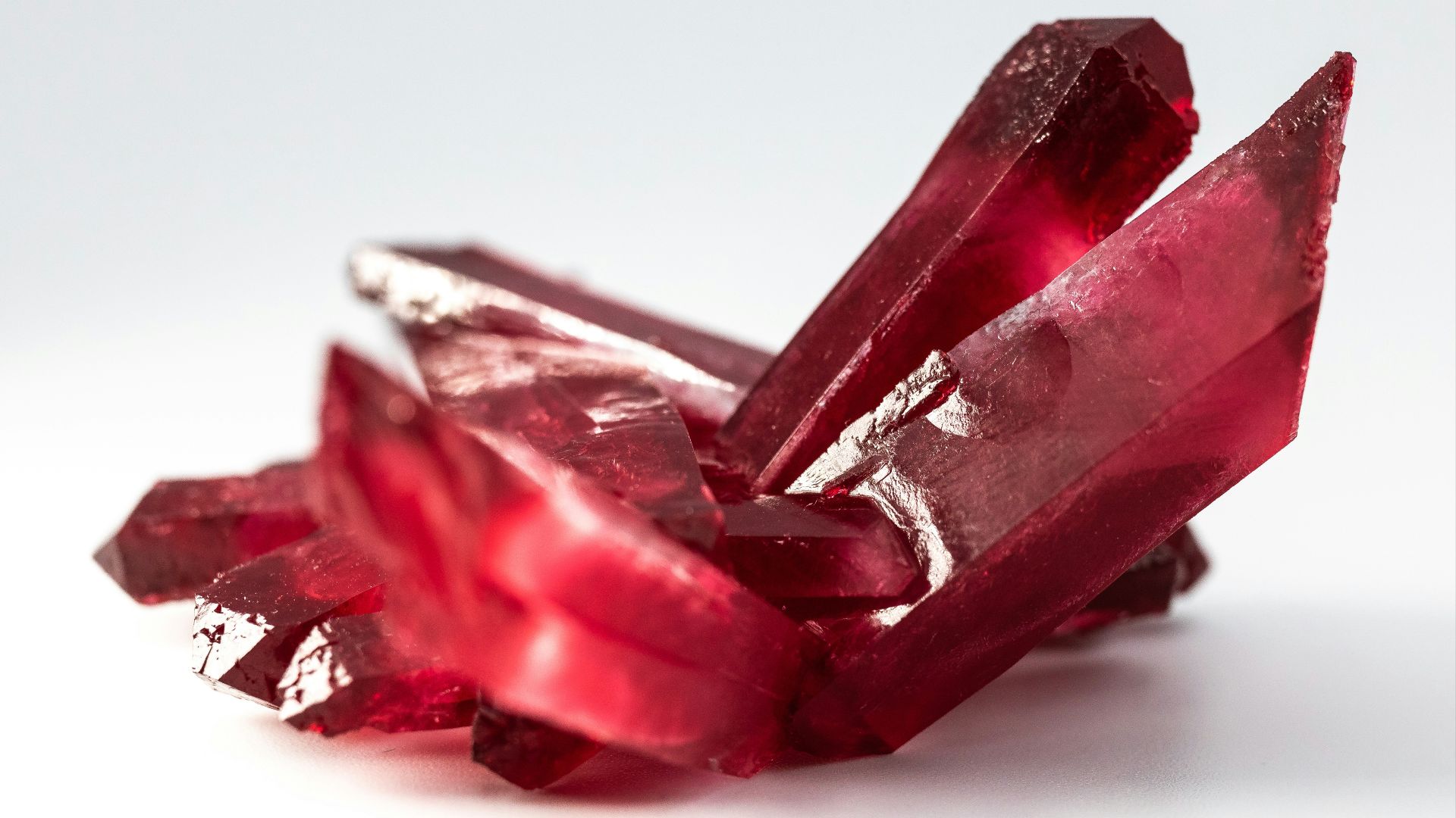 selective focus photo of red gemstone
