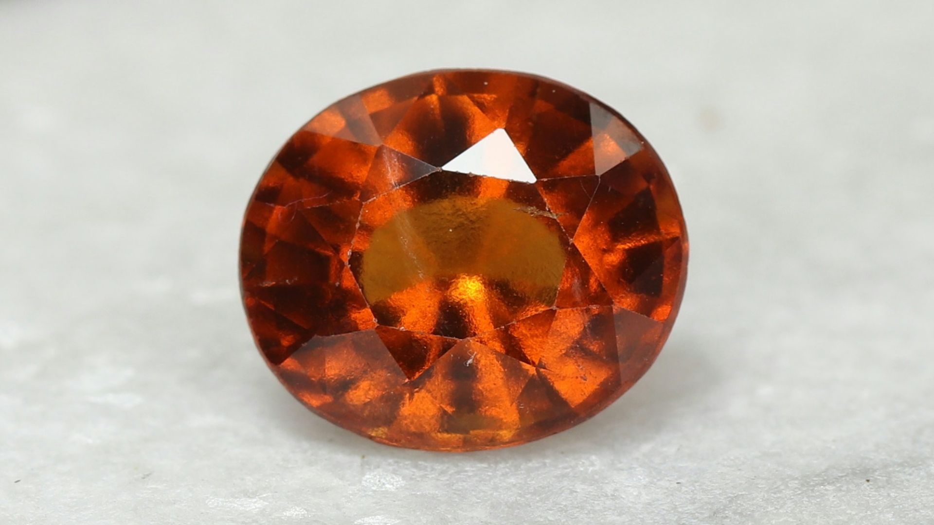 a close up of a diamond near a pair of scissors