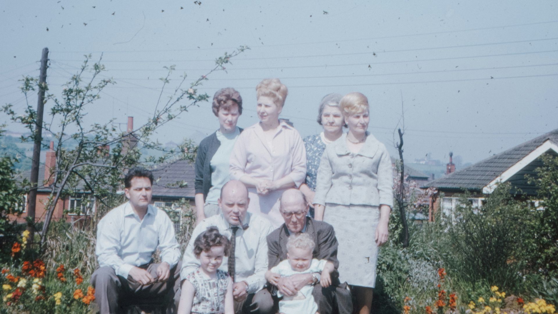man in white dress shirt sitting beside woman in white long sleeve shirt