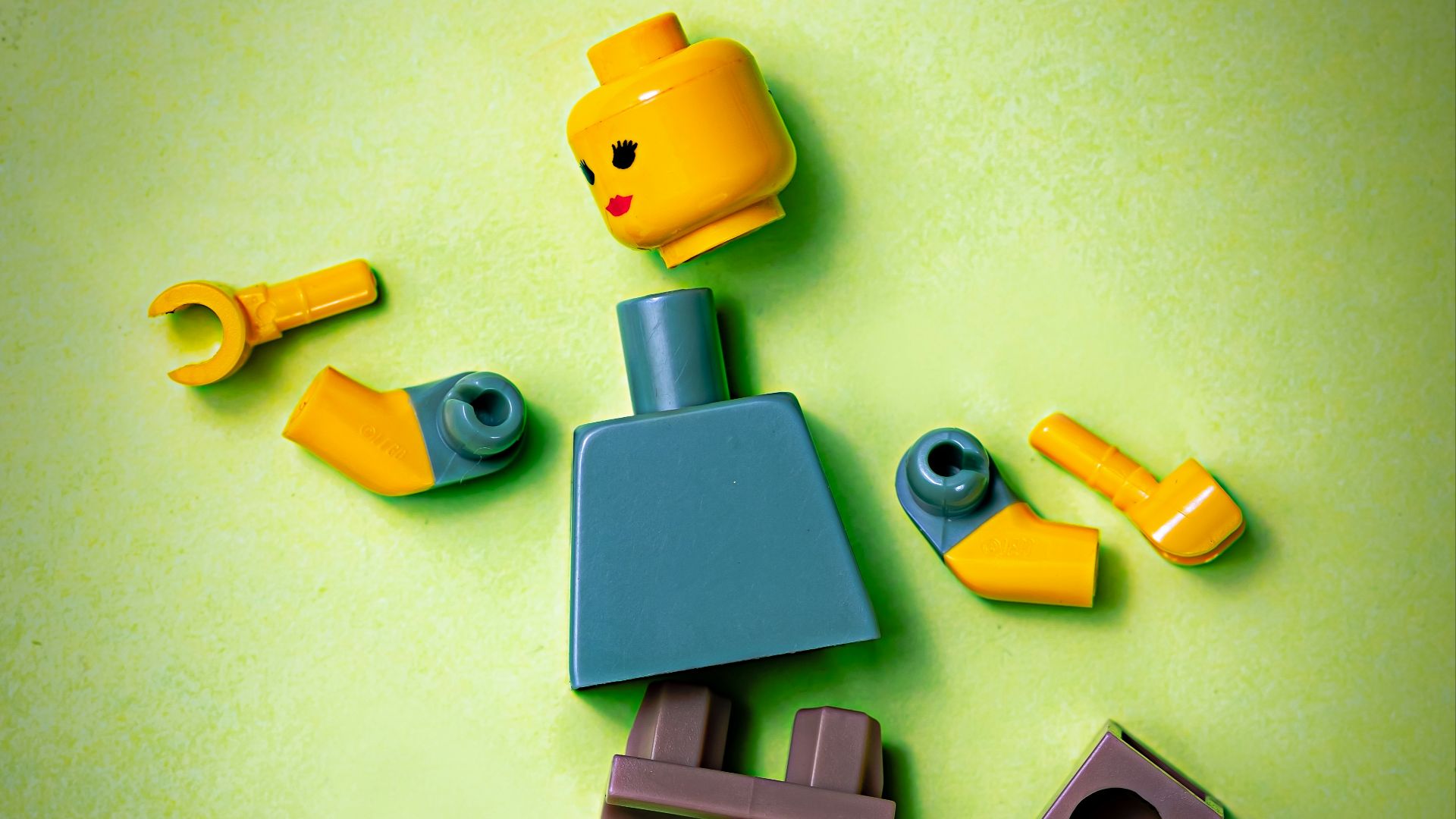 blue orange green and yellow plastic toy