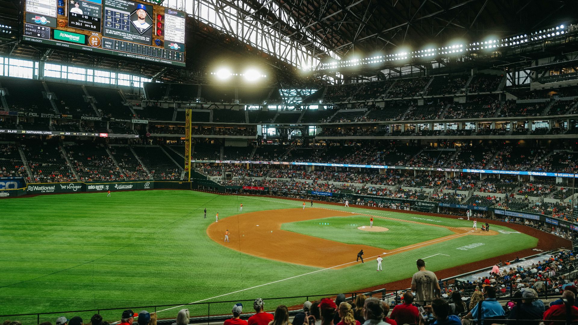 a baseball stadium with a full crowd