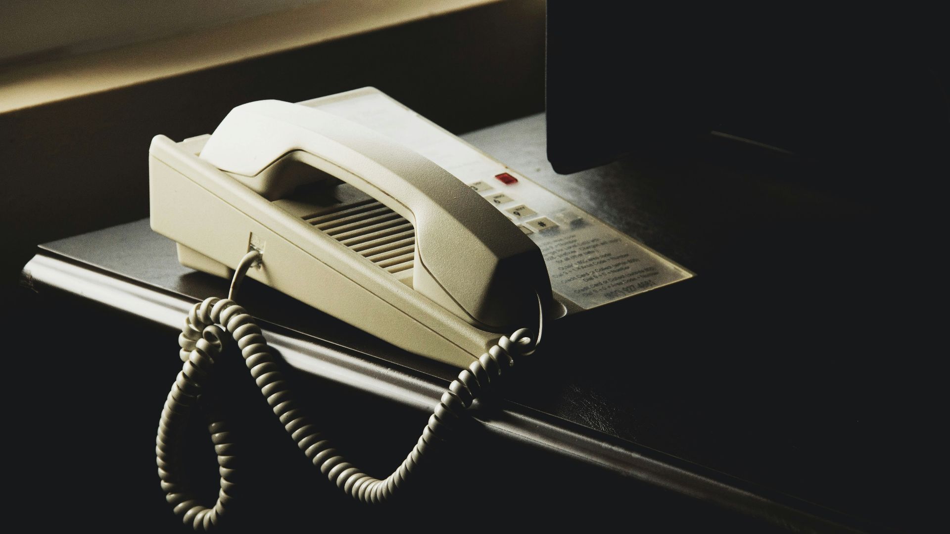 white and black ip desk phone