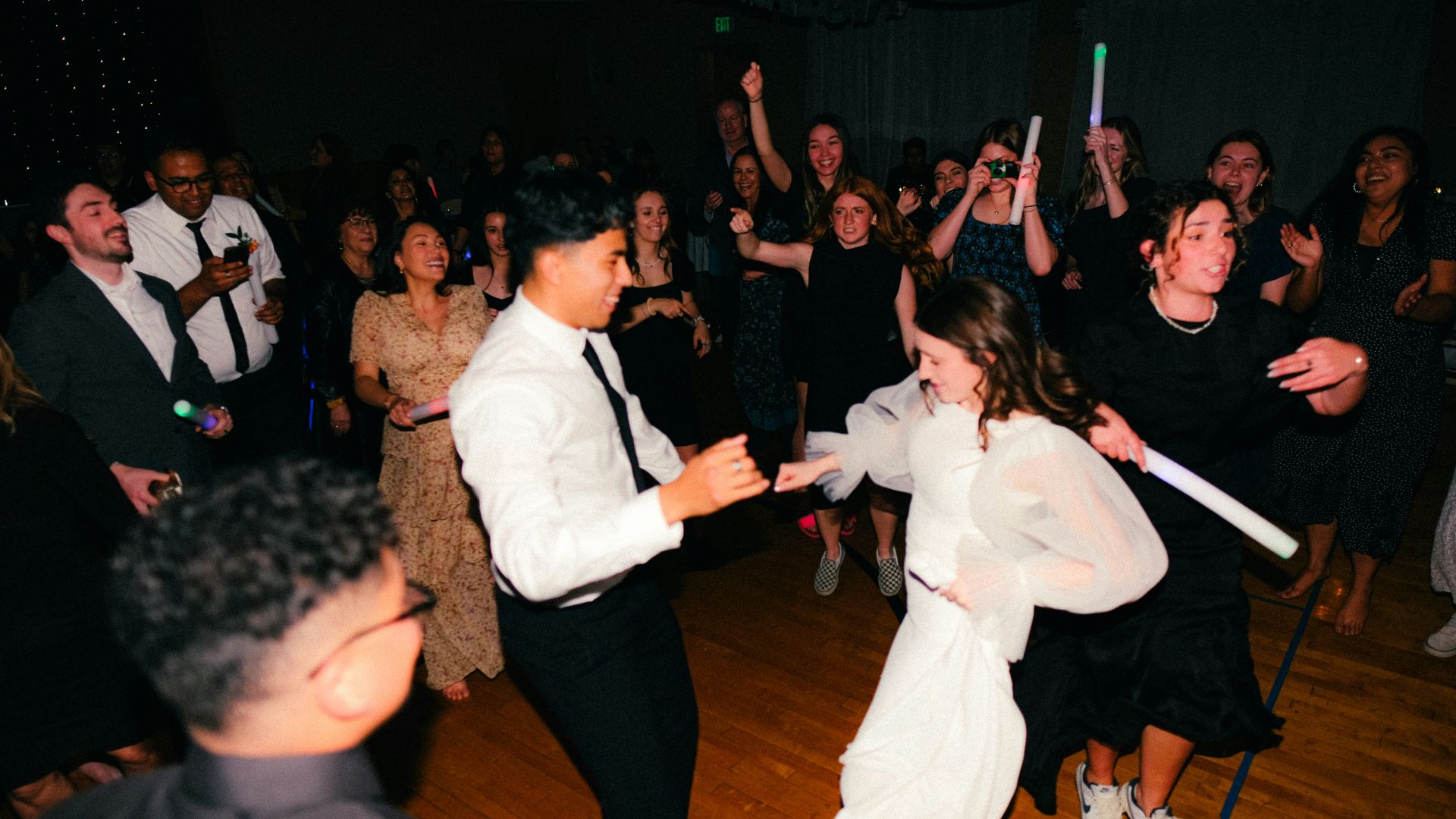 a couple of people that are on a dance floor