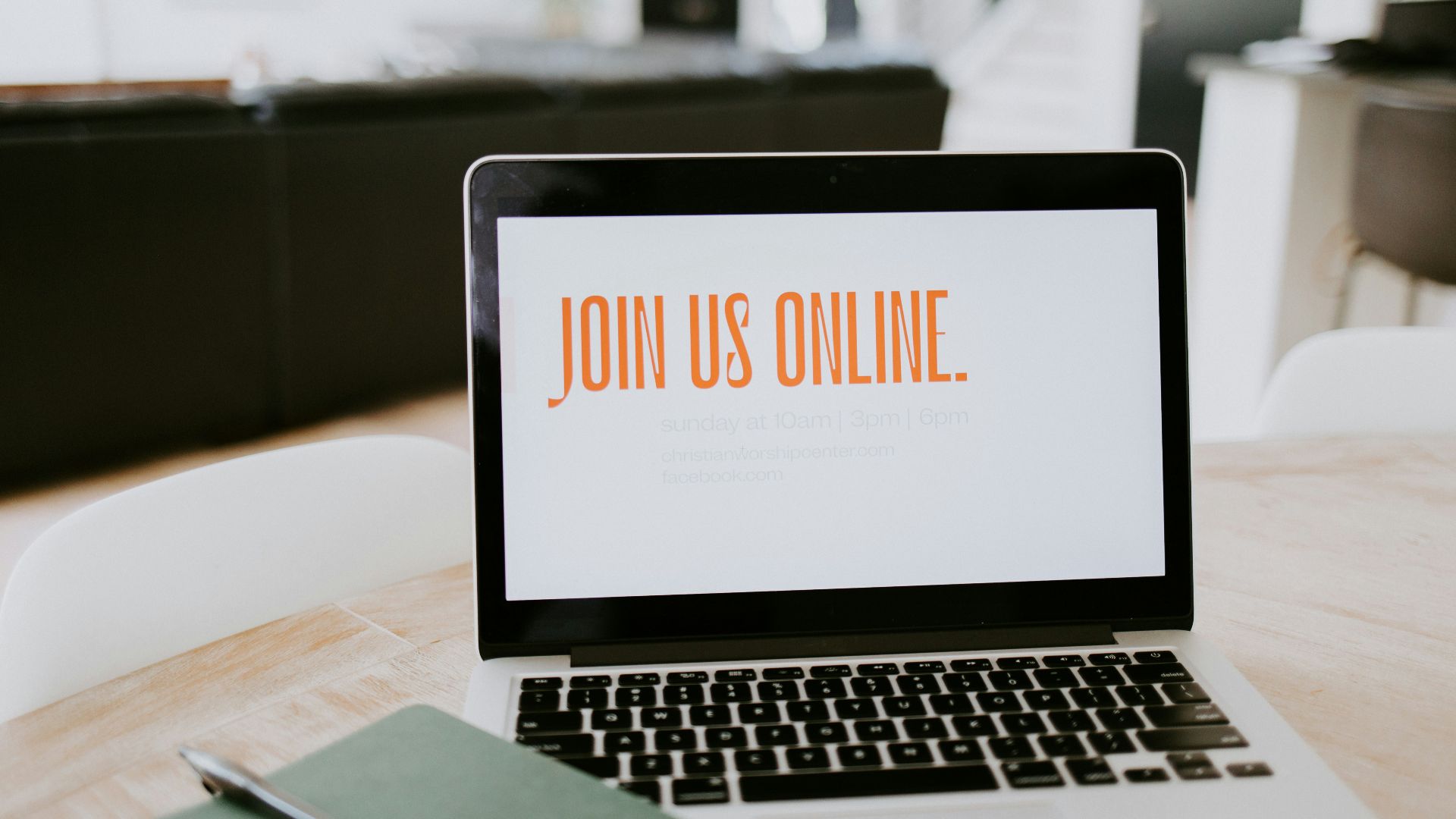 macbook pro on brown wooden table