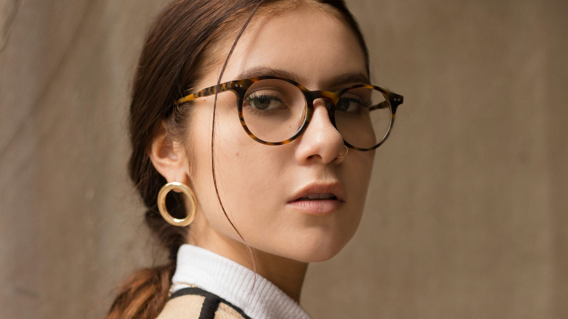 woman wearing brown and black coat