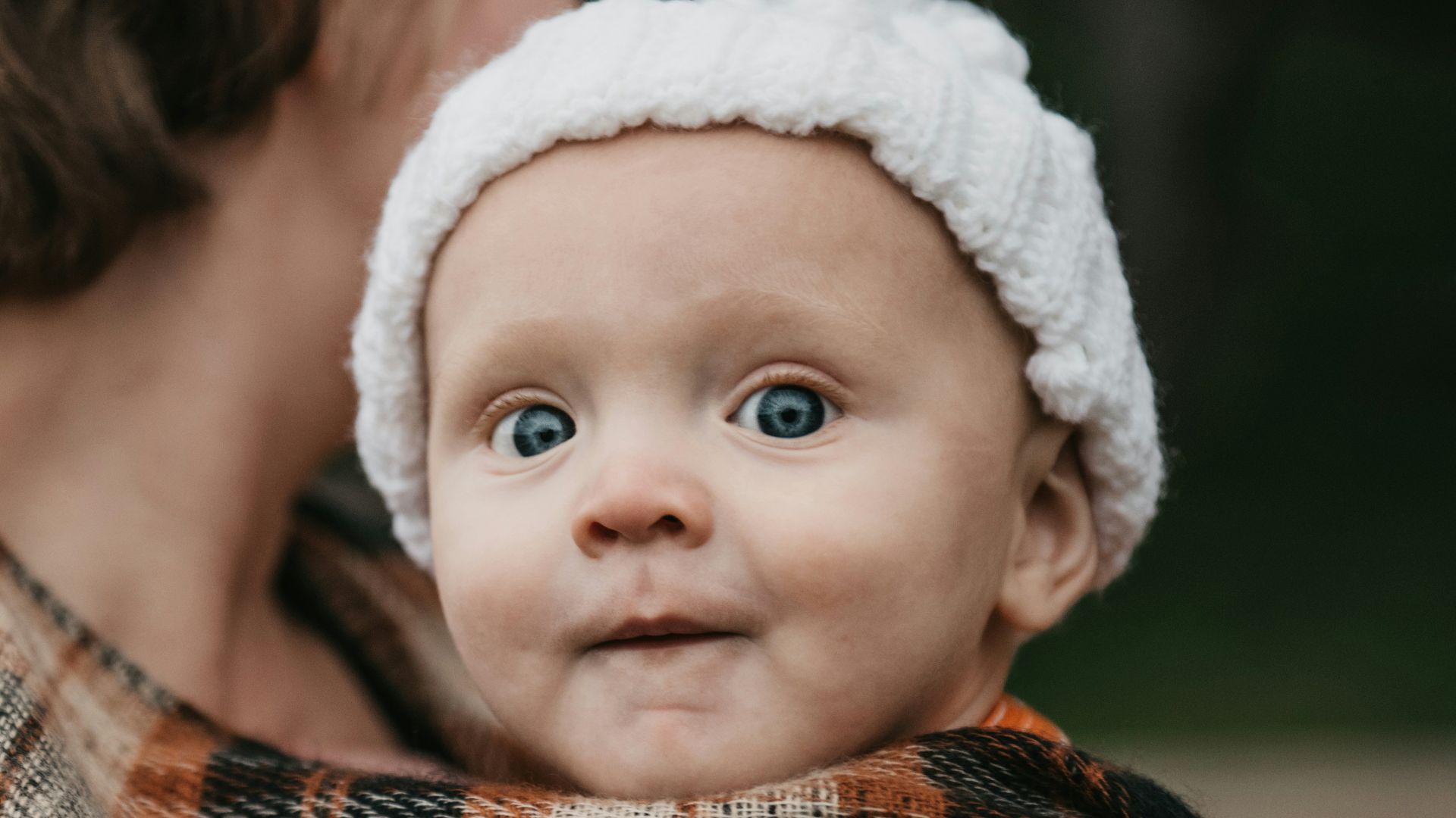 a person holding a baby