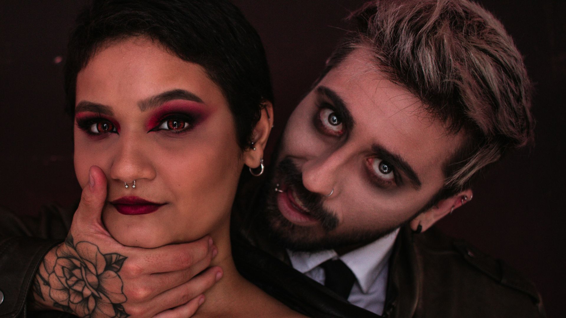 a man and a woman posing for a picture