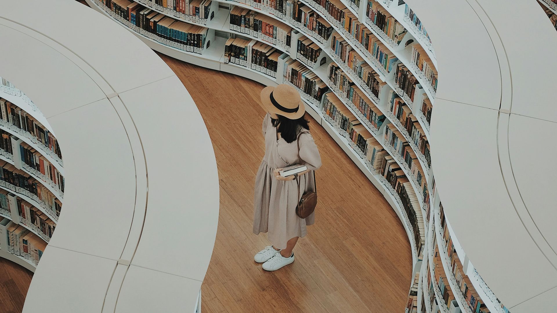 woman standing on bookstore