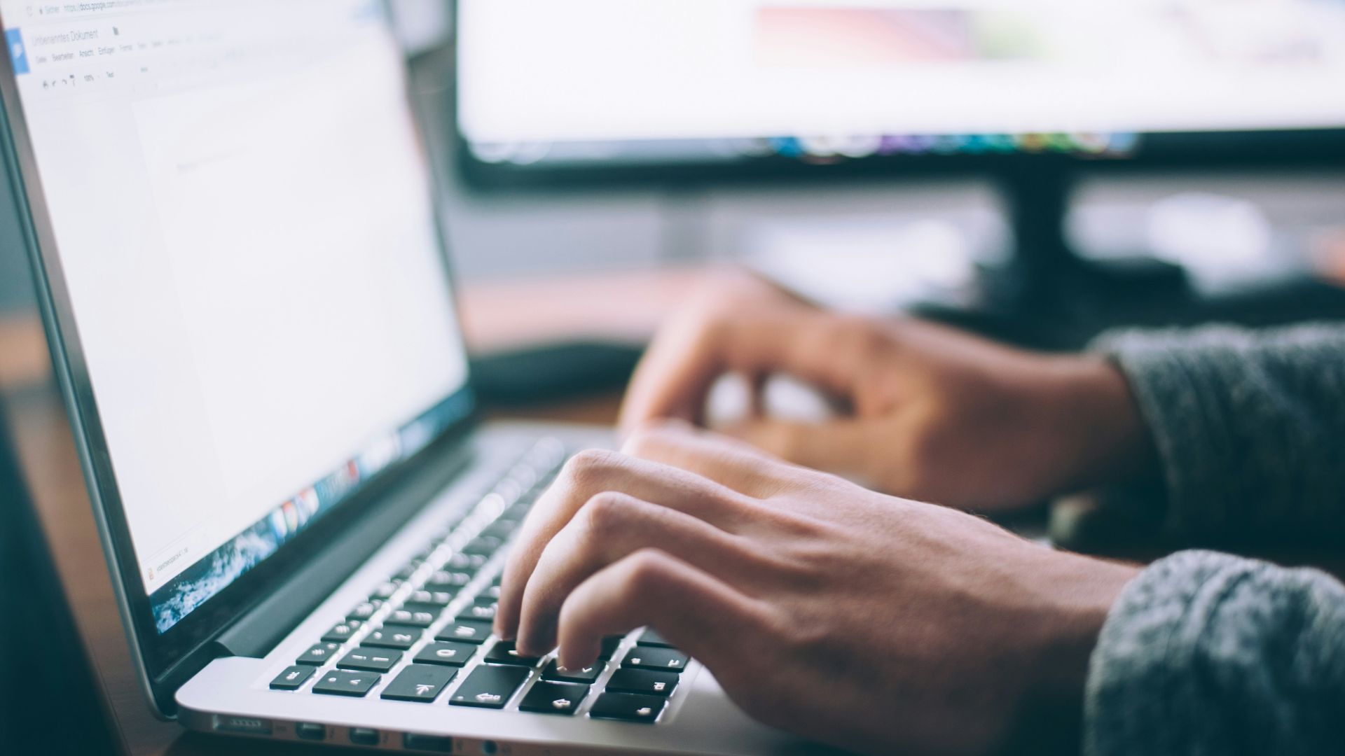 person using MacBook Pro