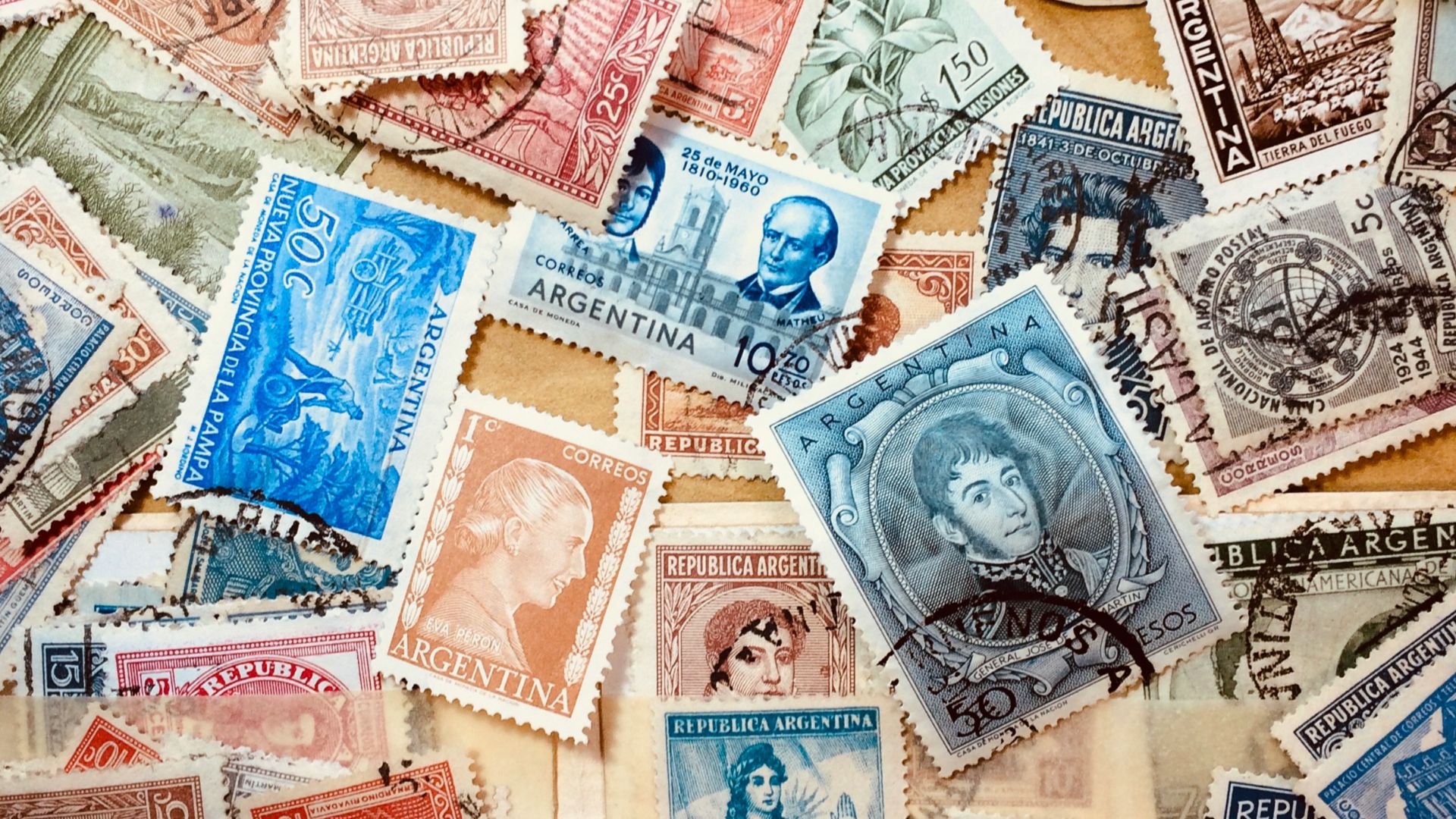 assorted coins on brown wooden table