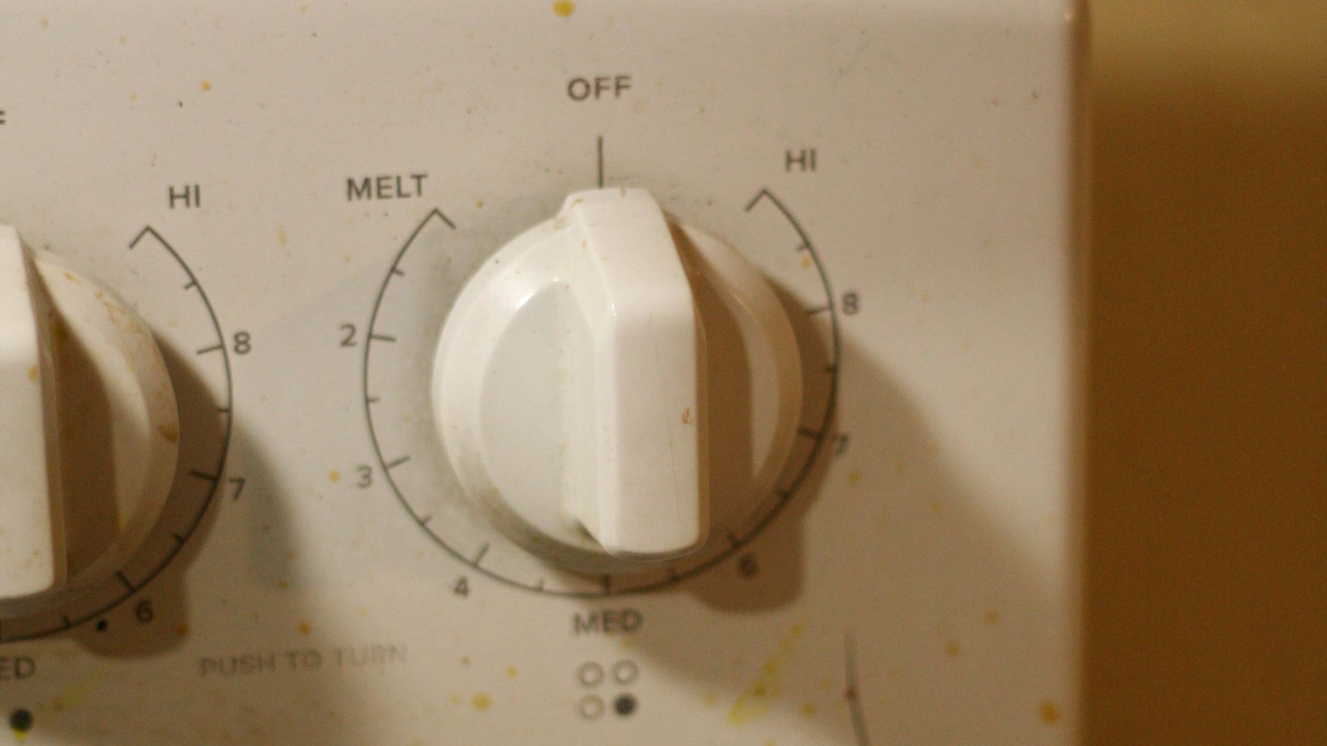 A close up of a white stove top oven