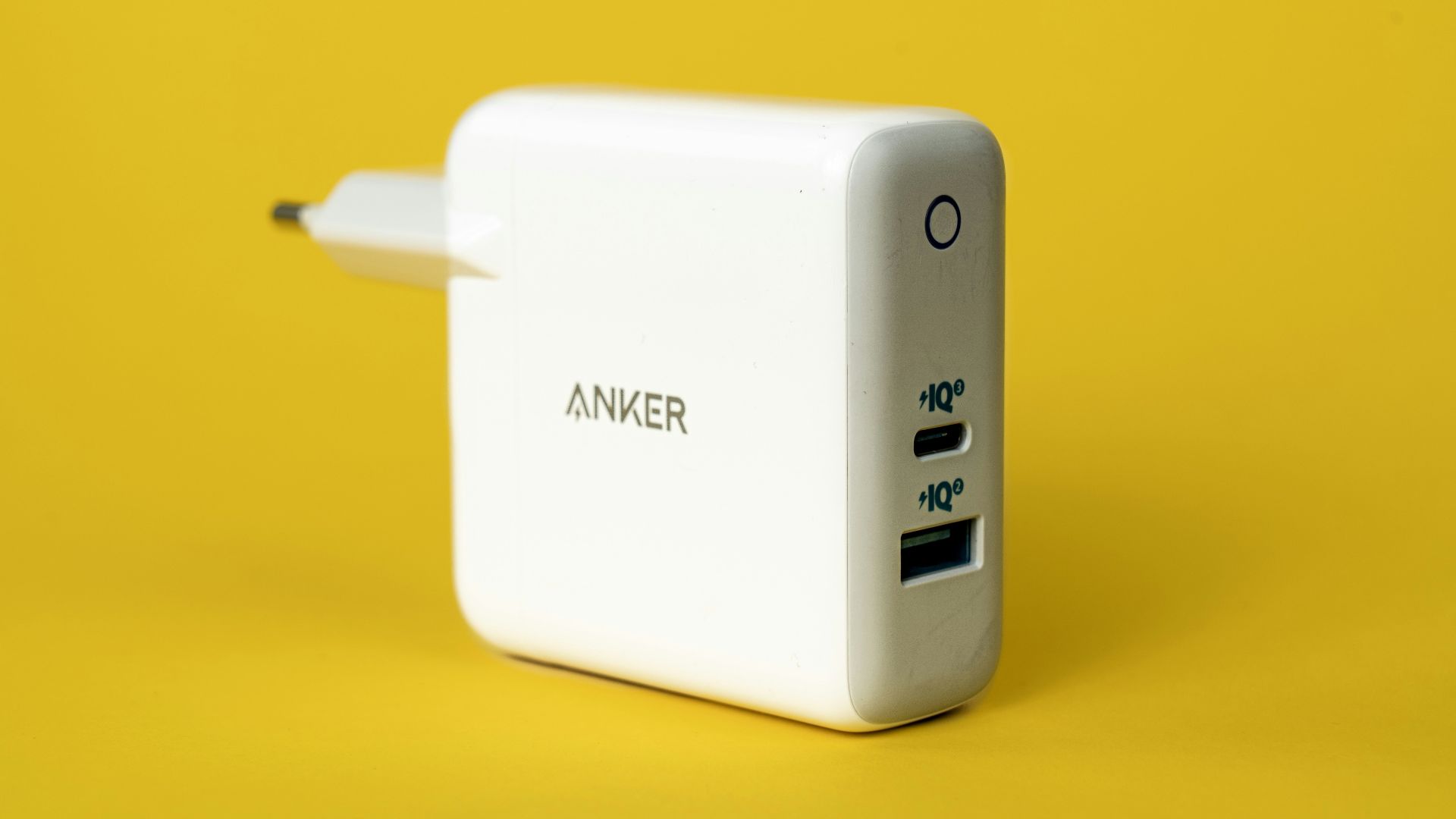 white samsung charger on yellow surface