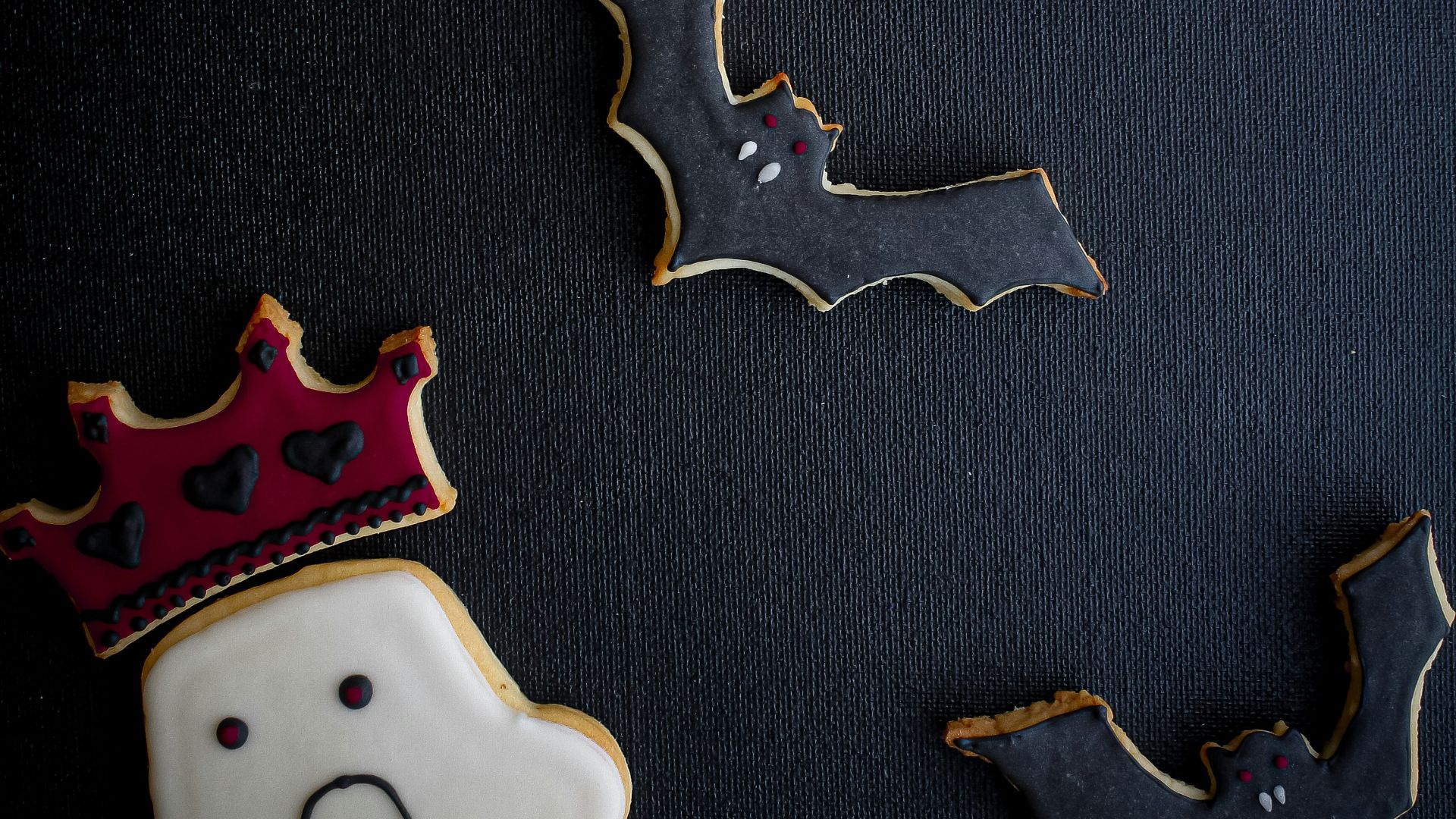 a group of small white and blue objects with faces on them