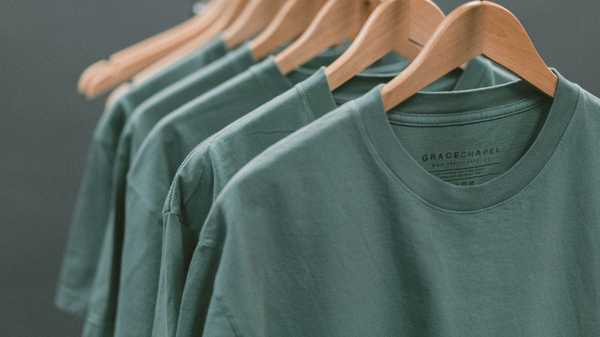 photo of blue crew-neck tops