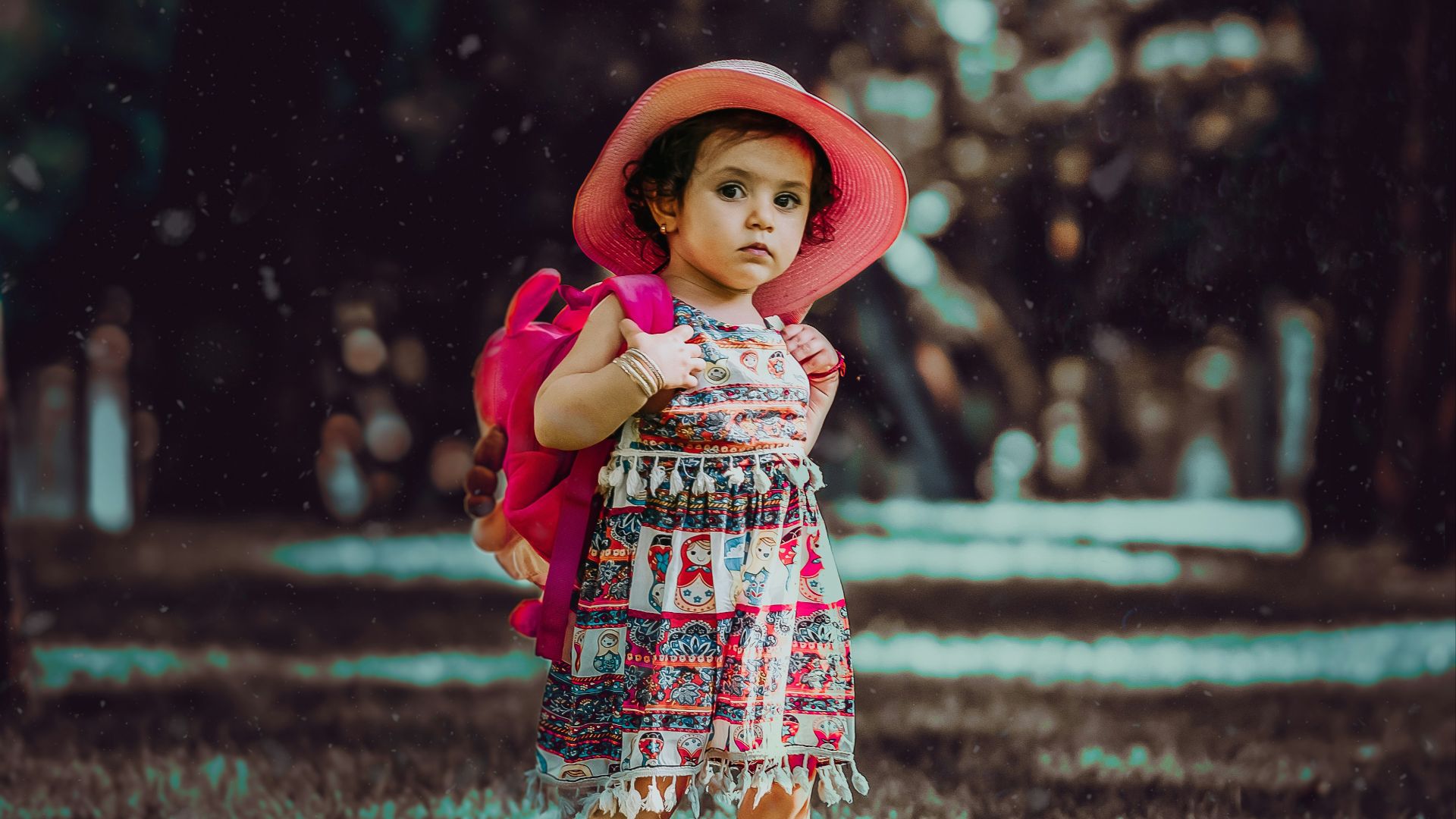 toddler carrying backpack
